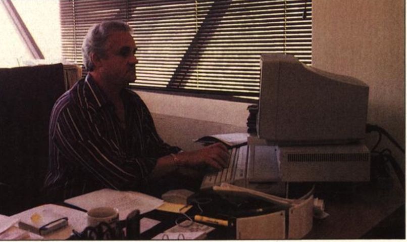 Sig Hartmann working at an Atari ST in his office