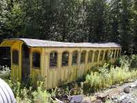 An old passenger car put out to pasture